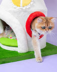 A cat walking out from the double-door condo of the Magic Mushroom Cat Tree