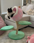 A cat on the Monster World Cat Tree in the living room