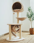 Cat relaxing in the hammock of the Bird Nest Cat Tree