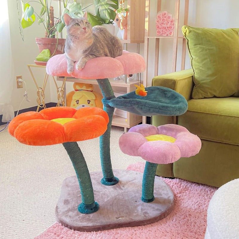 A cat on the pink flower platform of the Bloomy Flower Cat Tree