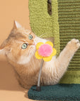 A cat scratching the textured board of the Cactus Cat Scratcher.