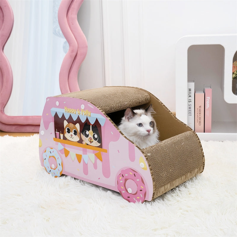 A cat sitting inside the Donut Car Cat Scratcher