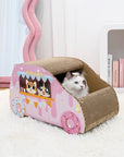 A cat sitting inside the Donut Car Cat Scratcher