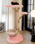 Close-up detail of a black cat climbing on the platform of the Cloud Swing Cat Tree