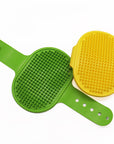 A Pair Of Cat Grooming Brushes