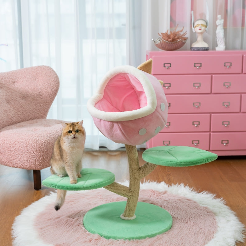 A golden tabby cat sitting on the Monster World Cat Tree in the living room