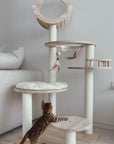 A kitten jumping across various platforms of the Transformable Cat Tree