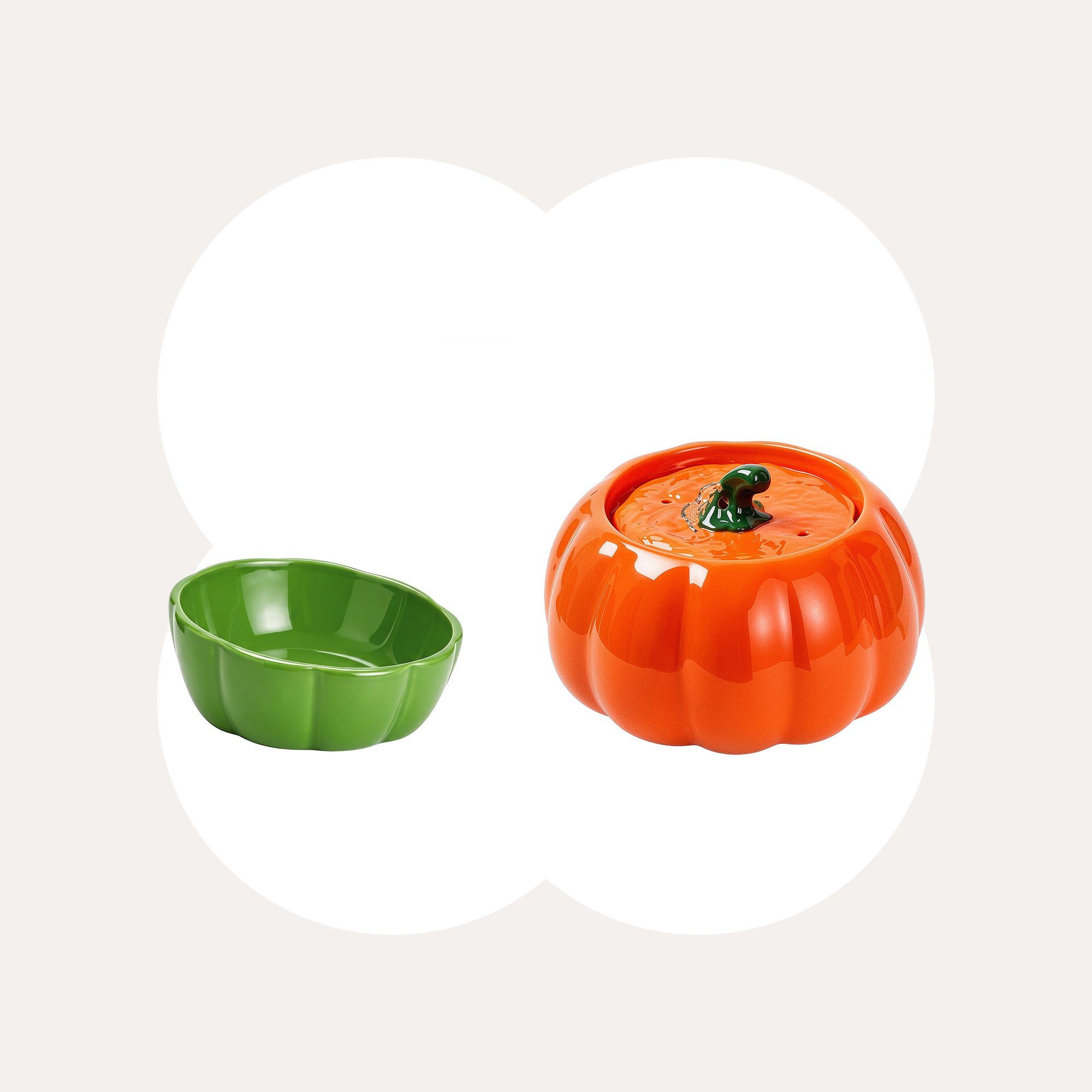 Orange Pumpkin Patch fountain with a green ceramic cat bowl.