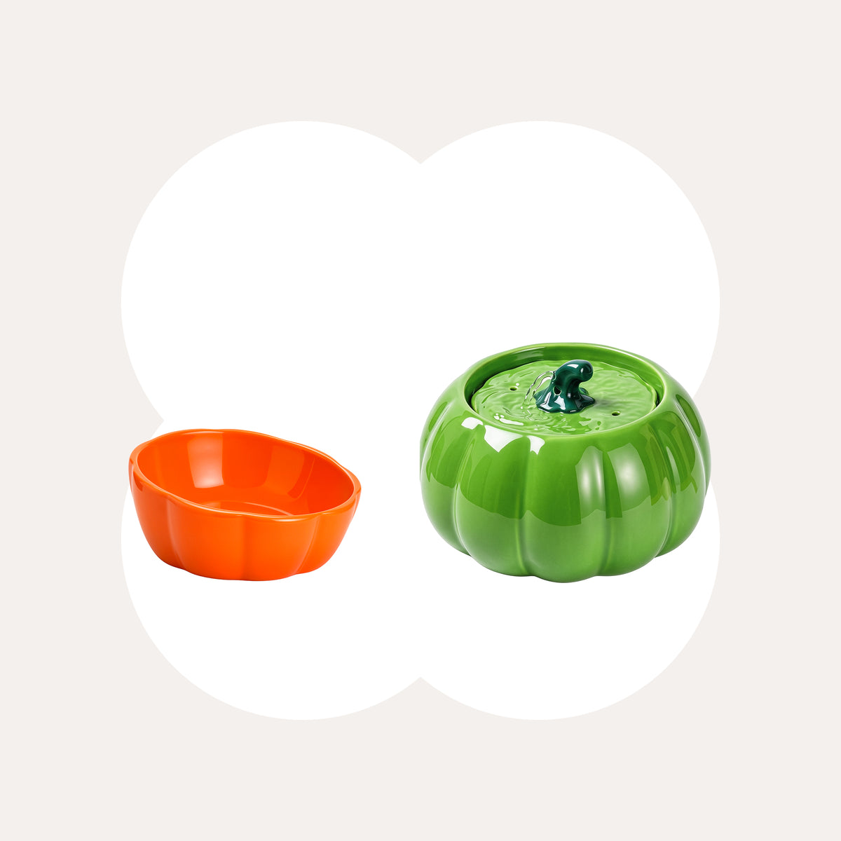 Green Pumpkin Patch fountain with an orange ceramic cat bowl.