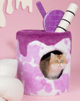 A cat sitting on the Taro Milk Tea Cat Tree looking out