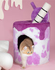 A cat walking out from the Taro Milk Tea Cat Tree