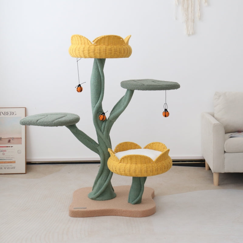 Three hanging ladybug toys on the Yellow Tulip Cat Tree