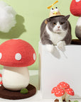 A cat sitting next to the Mushroom Cat Scratcher, showcasing its compact size and playful design.