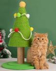 Kitten playing next to the Christmas Tree Cat Scratcher, emphasizing its suitability for all ages.