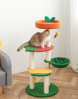 A cat playing with the hanging ball toy on the Fruit World Cat Tree