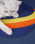 Cat playing with the Space Series Cat Scratching Pad, demonstrating its interactive features.